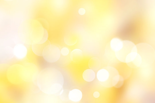 Yellow blurred bokeh abstract background.