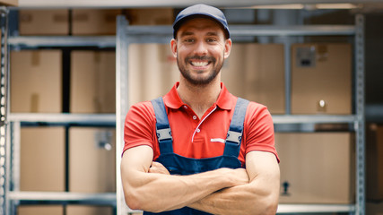 Warehouse Worker Crosses Arms and Smiles. 