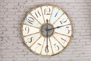 Retro clock showing two thirty on the wall