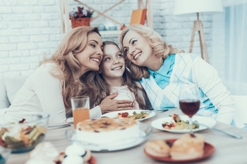 Family Celebrating Daughter's Birthday at Home.