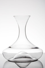 Classical glass decanter for wine,  empty, on white background