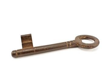 Old rusty key isolated on white background