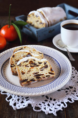 Stollen, traditional Christmas cake and cup of coffee