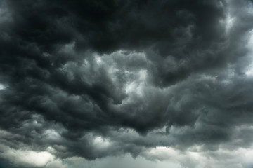 Dramatic black clouds before rainy, Motion heavy storm and dark sky in summe, Bad weather with...