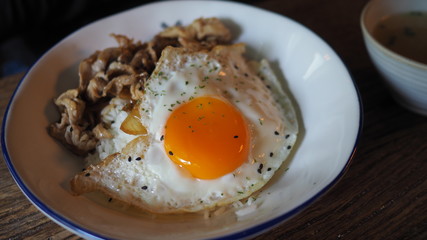fried egg with pork