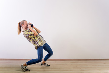 different photographer poses: bending, squatting, lying down