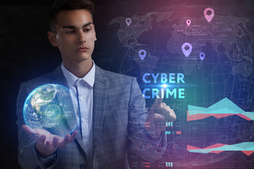 The concept of business, technology, the Internet and the network. A young entrepreneur working on a virtual screen of the future and sees the inscription: Cyber crime
