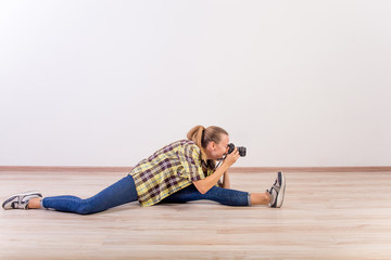 different photographer poses: bending, squatting, lying down