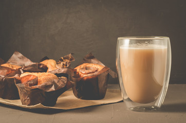 cakes with a chocolate stuffing and cappuccino glass/cakes with a chocolate stuffing and cappuccino glass. Selective focus
