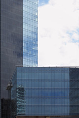 photo of high-rise buildings of glass and metal