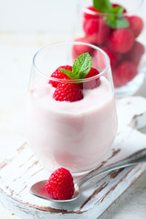 Yogurt smoothie with raspberries, fruit dessert, healthy dieting concept Natural detox.