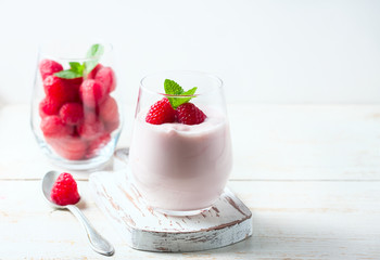 Yogurt smoothie with raspberries, fruit dessert, healthy dieting concept Natural detox.