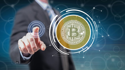 Man touching a bitcoin currency concept