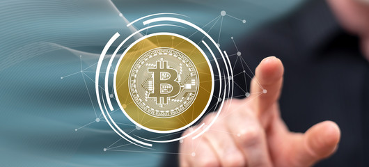 Man touching a bitcoin currency concept
