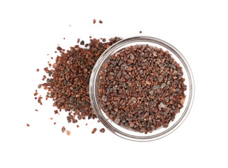 Close up glass bowl of Indian brown salt