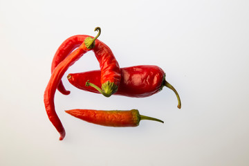 Red pepper on white isolated background. Pattern