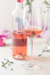 Glass and bottle of rose wine