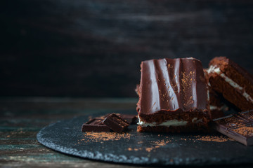 homemade chocolate brownies on dark background