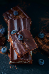 homemade chocolate brownies on dark background