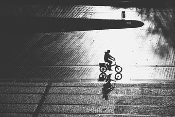 aerial view of biker silhouette - street scene - contrast black and white Nantes, FRANCE - NOVEMBER...