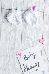 birth of child - baby shower concept on wooden background