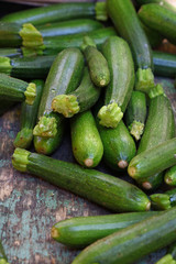 Close up fresh green zucchini on retail display