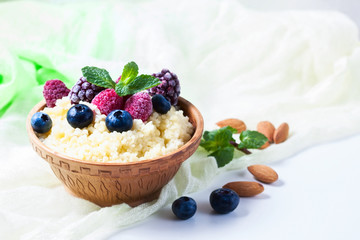 Healthy couscous salad with berries.