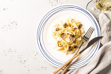 Tagliatelle pasta with black truffles and parmesan cheese