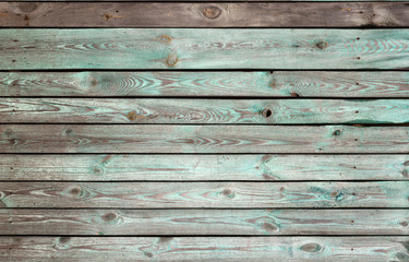 Fototapeta premium The old wooden walls painted green. Old wooden wall background or texture.