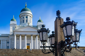 Fototapeta na wymiar Street lamp and the Lutheran Cathedral, in Helsinki