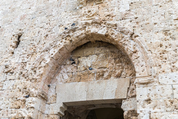 Fragment  of the Zion Gate with traces of bullets from the Six-Day War of 1967 in old city of Jerusalem, Israel