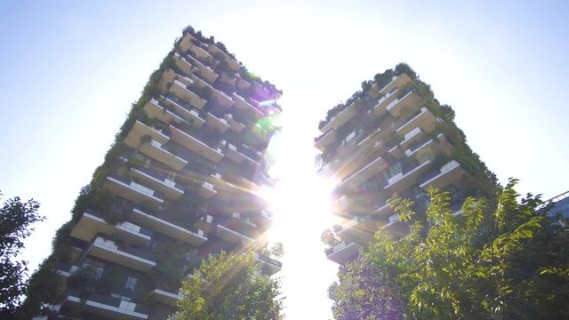 Milan, Italy - September 26, 2018: Modern and ecologic skyscrapers with many trees on every balcony