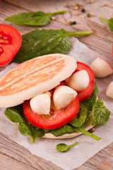 Tigella bread with spinach and tomatoes. 