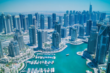 Fototapeta premium Aerial view of skyscrapers and Dubai Marina. Development of Dubai.
