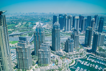 Aerial view of skyscrapers and Dubai Marina. Development of Dubai.