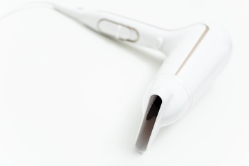 White hairdryer on white background.