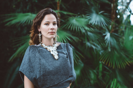 Woman surrounded by plants