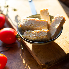 tempeh with tomatoes and garlic, Tempeh is very famous Indonesian food made from soya bean, vegan...
