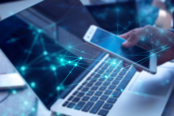 business man with smartphone mobile and laptop notebook computer in network social digital online connect to data concept