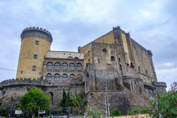 Scenic view of new castle (Castel Nuovo) in ancient touristic town Naples (Napoli) in Italy