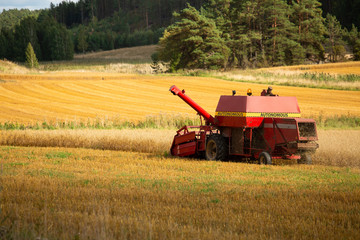 Autonomous harvester on a wheat field.