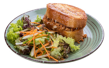 Breakfast. Toast with rabbit, cheese and herbs
