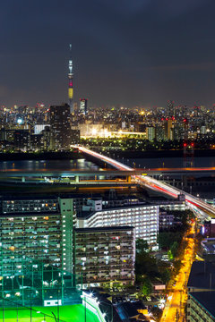 Tokyo skytree tower in Janpan in night light with brigde and building
