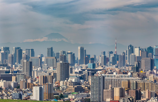 Building of Tokyo city with Tokyo tower and skyline of Fuji mountain in Japan
