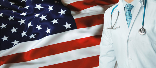 Concept of national health care and medicine system in USA America. Confident professional doctor in white coat with stethoscope - Powered by Adobe