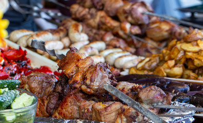 Street food, grilled meat on a spit. Homemade.