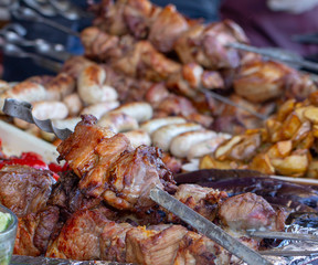 Street food, grilled meat on a spit. Homemade.