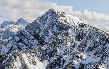 Snow-capped mountain peaks. Mountain landscape.