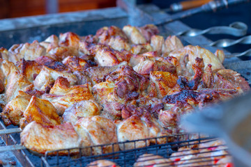 Street food, grilled meat on a spit. Homemade.