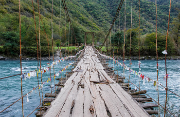 Fototapeta premium Bridge over the river in Abkhazia
